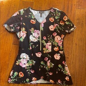 Jaanuu scrub top with gold front zipper and hidden side pockets. Size S.